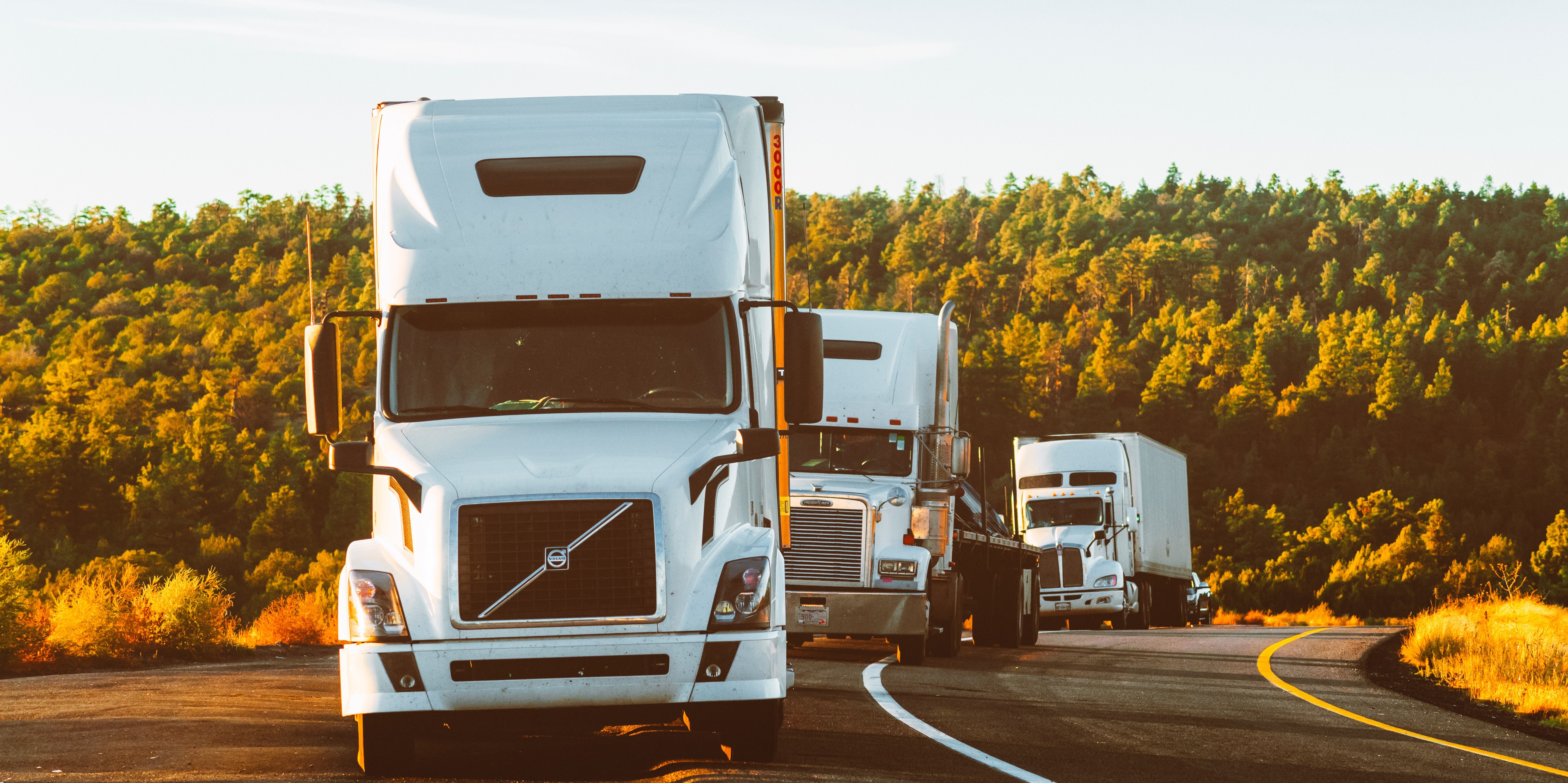 trucks on a highway trucks on a highway