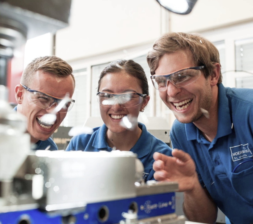 3 trainees with safety goggles 3 trainees with safety goggles