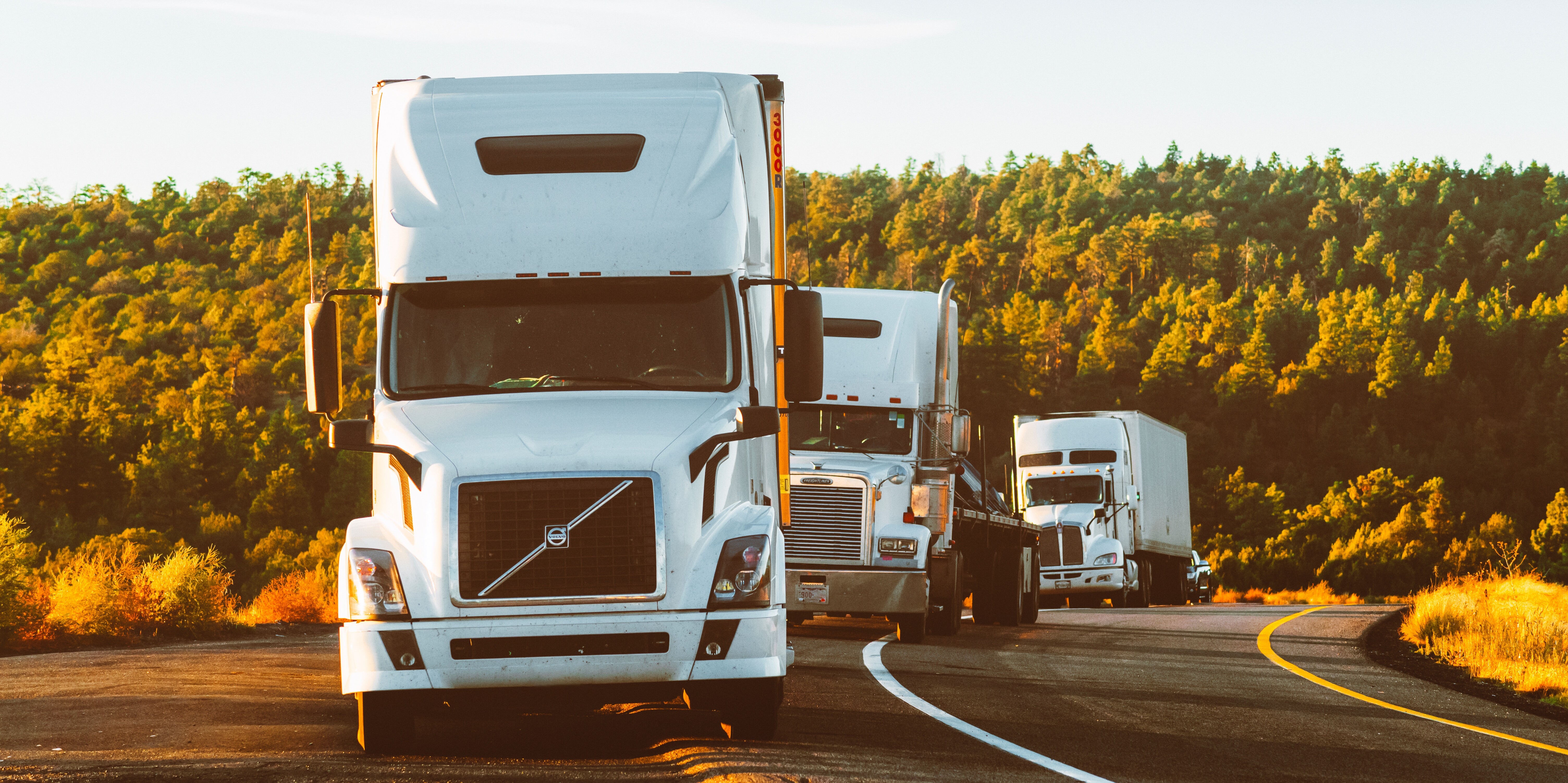 trucks on a highway trucks on a highway