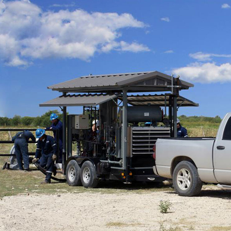 Project team Well, compressor and engineers in the field